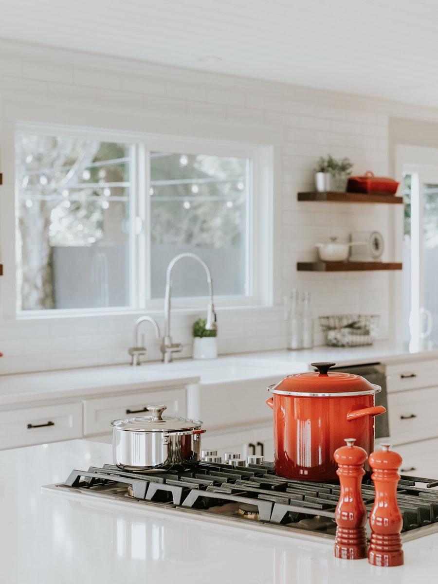 Renovated bright white kitchen with open shelving